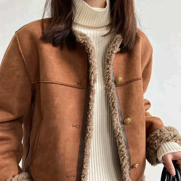 Nikita | Hyggelig jakke med knapper i imiteret shearling