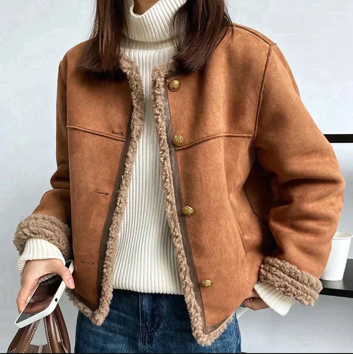 Nikita | Hyggelig jakke med knapper i imiteret shearling